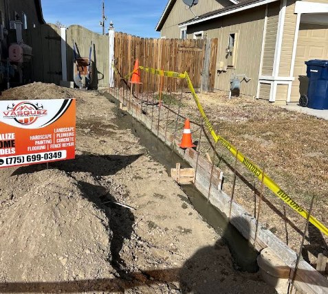 Formed and rebar-reinforced concrete footings along a side yard walkway in Fernley, Nevada