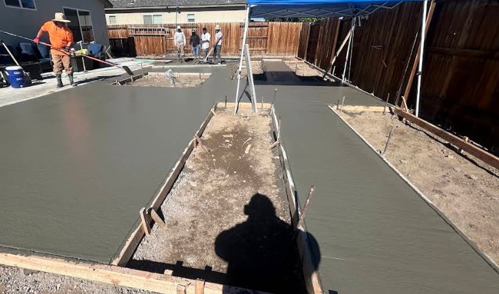 Freshly poured and finished backyard concrete patio slab at a Fernley Nevada property